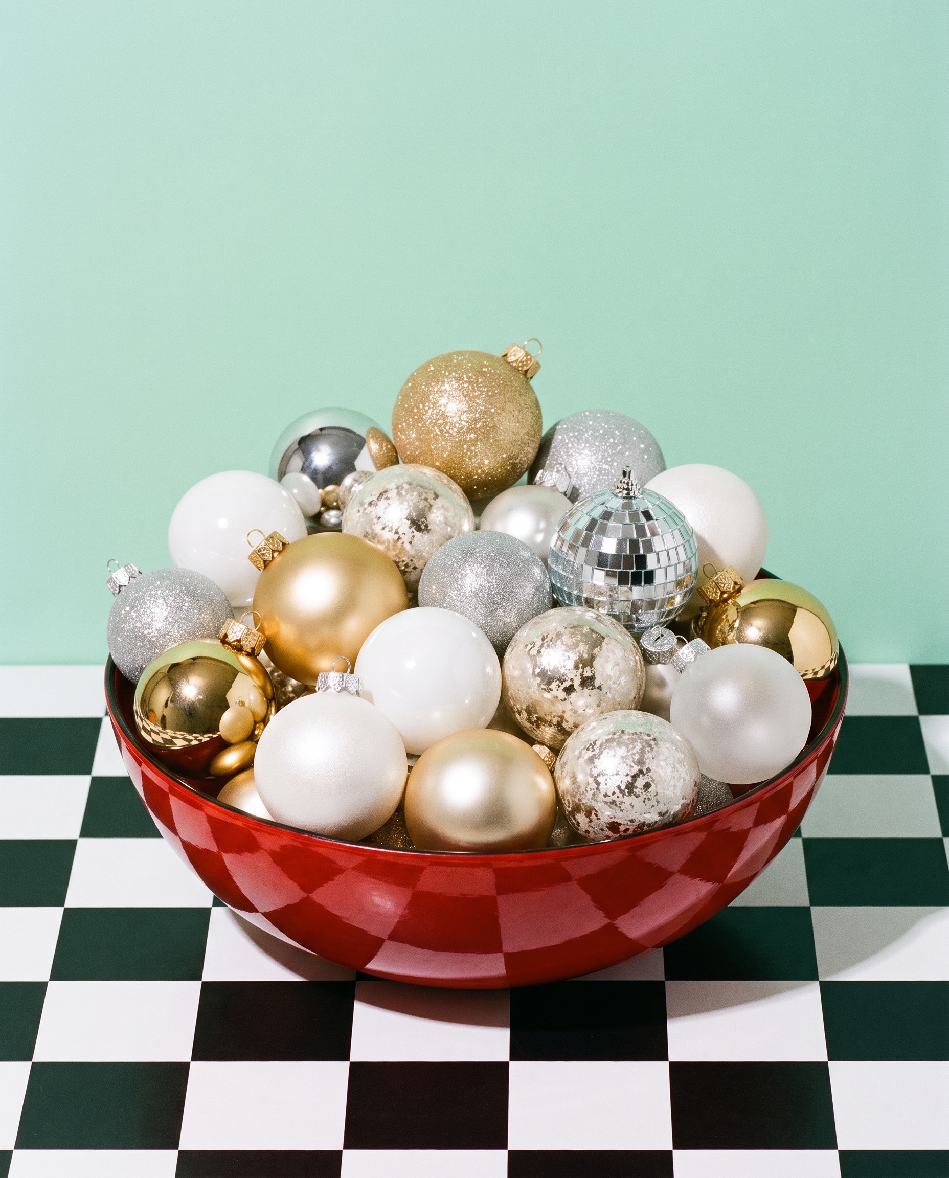 Bowl of champagne, gold, white and silver baubles